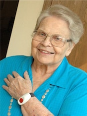 Senior wearing a medical alert button