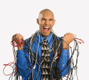 A man suffering from tangling wires all over him